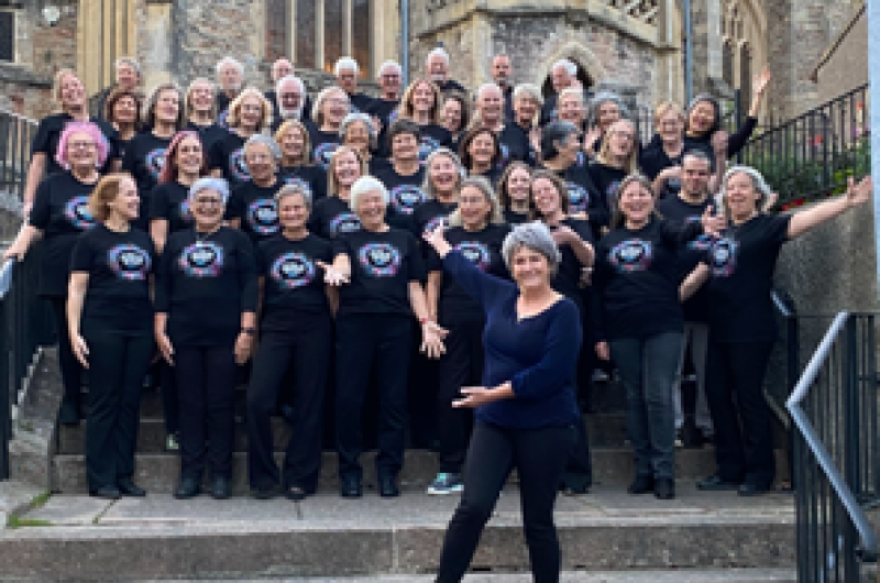 Group of people on steps outside a church