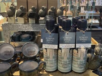 Variety of products - waterbottles, mugs, necklaces
