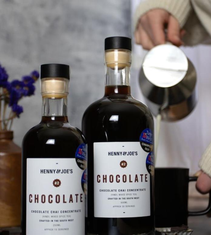 two bottles of chai syrup