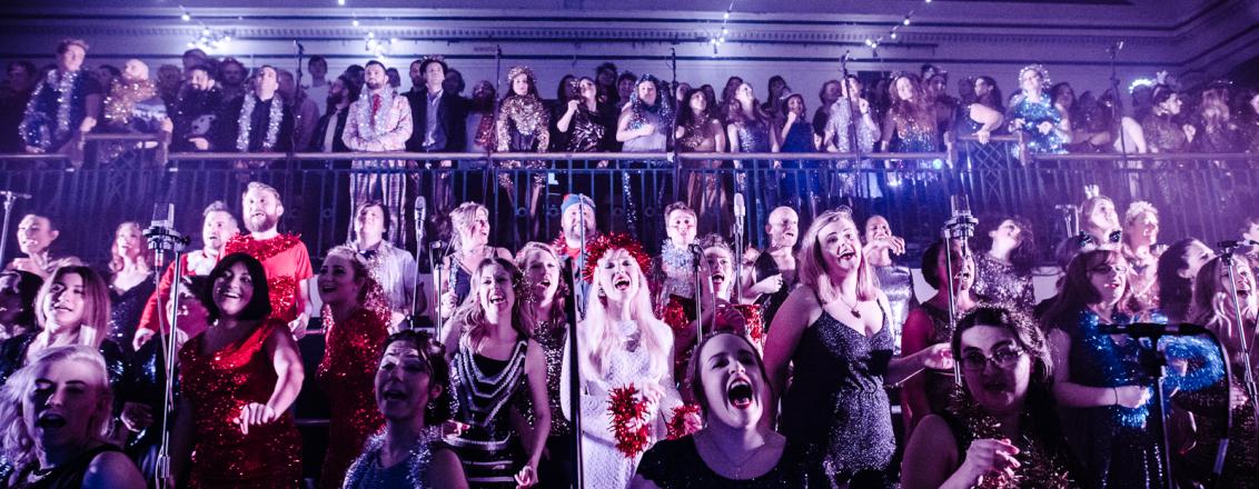 A choir Singing Indoors
