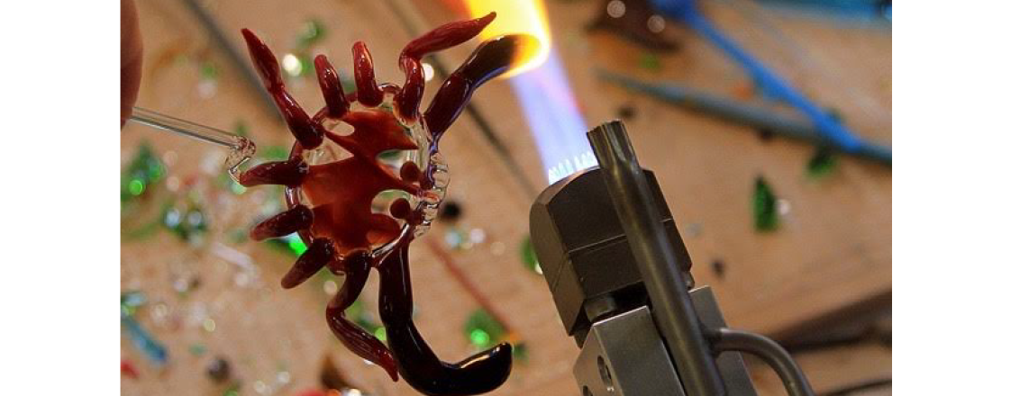 a glass crab being made